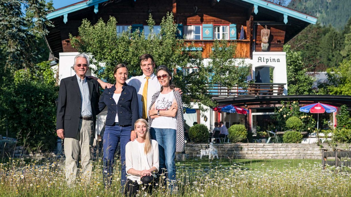 The Stoll family in front of the Stoll's Hotel Alpina in Schönau am Koenigssee